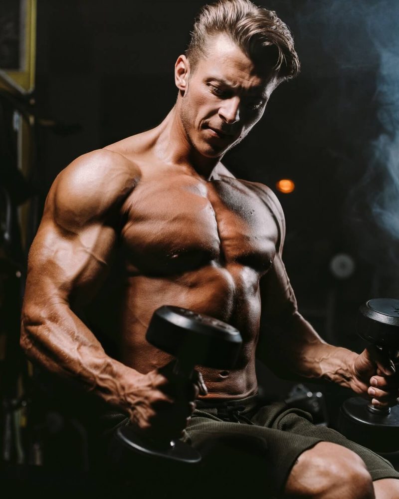 handsome-bodybuilder-works-out-pushing-up-excercise-in-gym-1.jpg